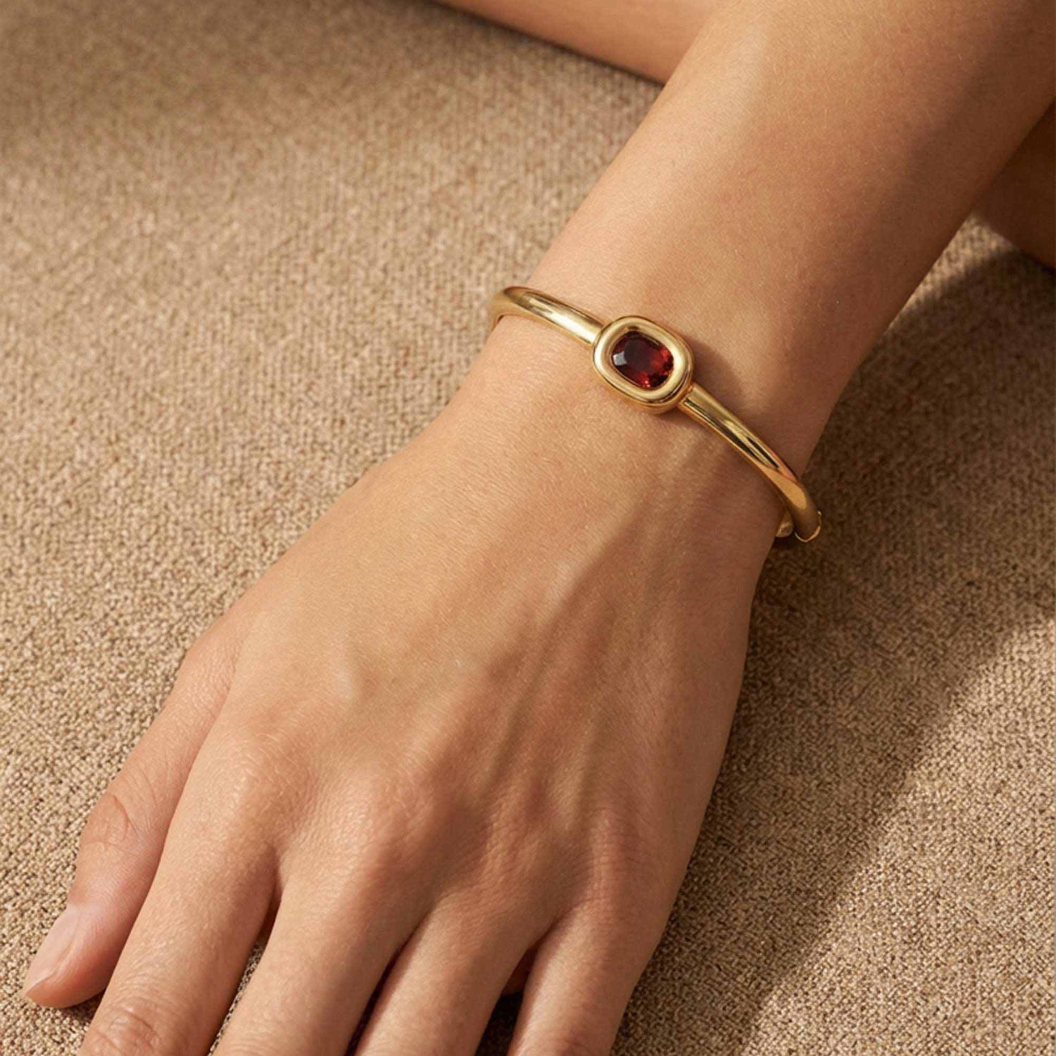 Satine Red Stone Yellow Gold Oval Bangle
